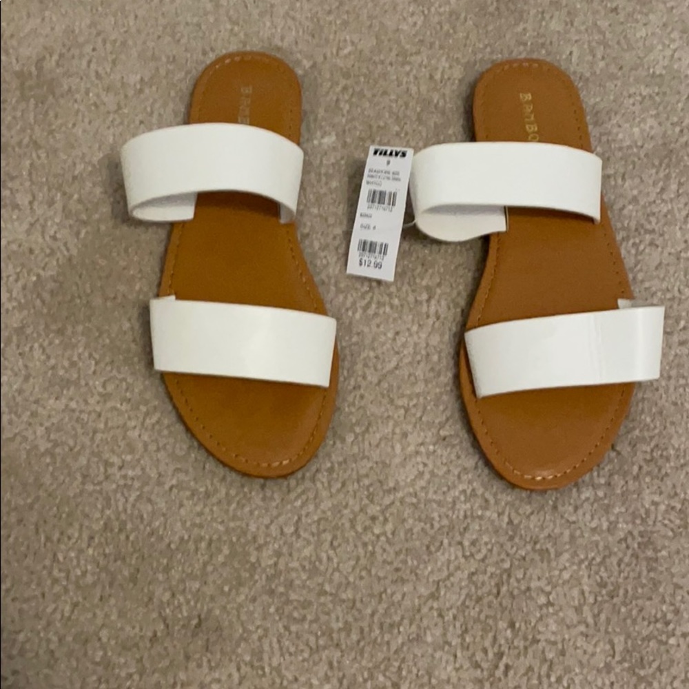White strap bamboo sandals.